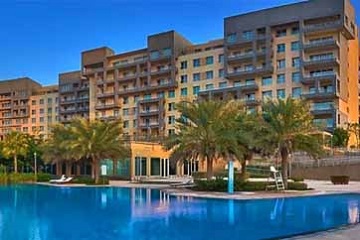 Exterior view with swimming pool at Luxury 4 Bedroom Apartment in Dubai