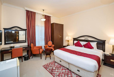 Spacious bedroom at City Stay Premium Hotel Apartments in Dubai